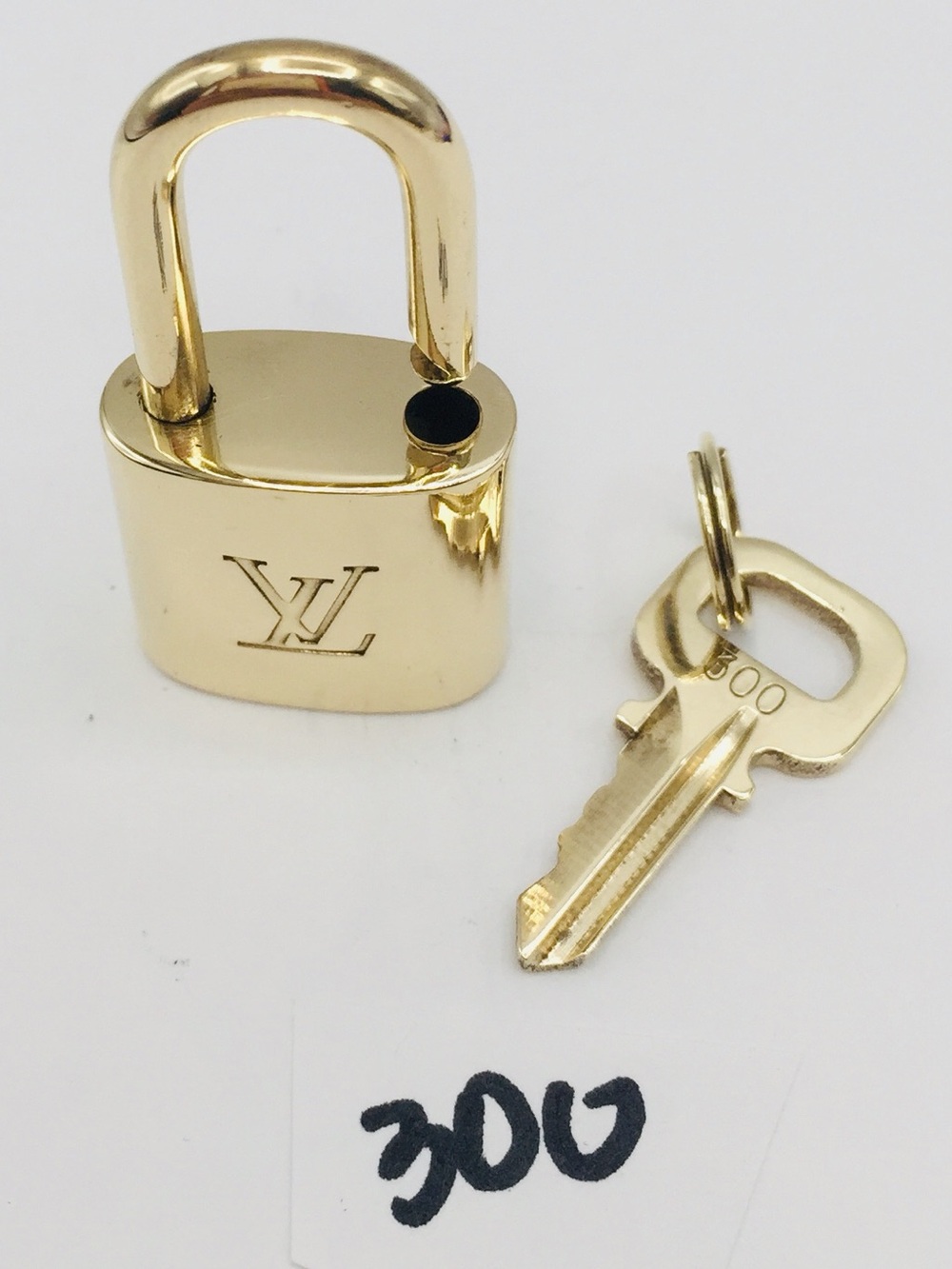 Louis Vuitton lock and key  300